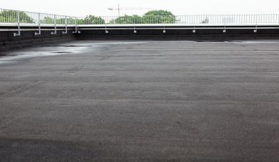 How Flat Roof Repair Prevents Structural Water Damage